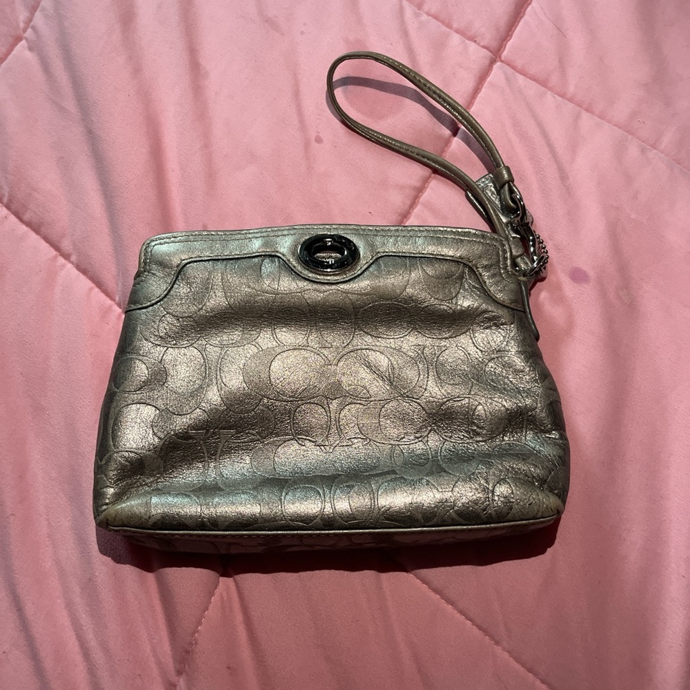 Gold coach purse
